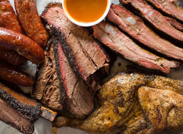 plate of bbq brisket and chicken