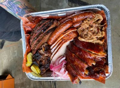 tray of barbecue with pickled veggies