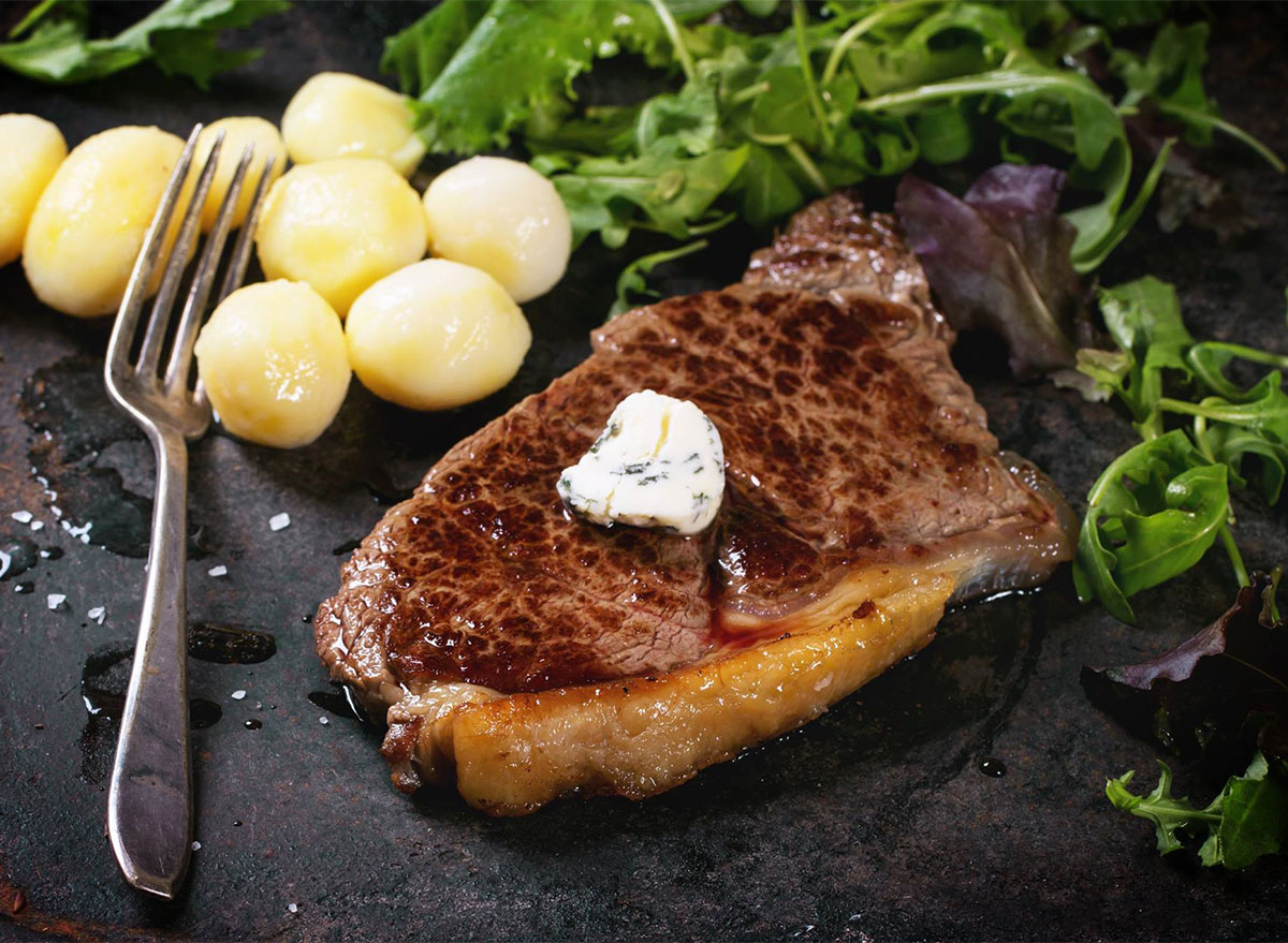 steak with butter and mini potatoes