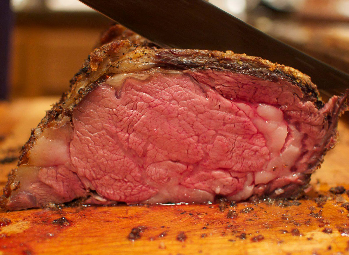 slab of prime rib on cutting board