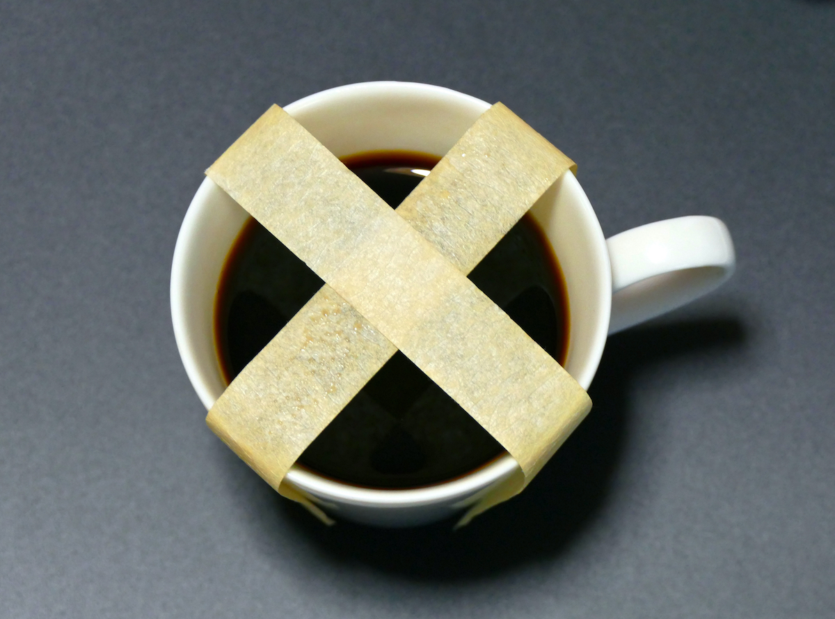 coffee mug with an x on it