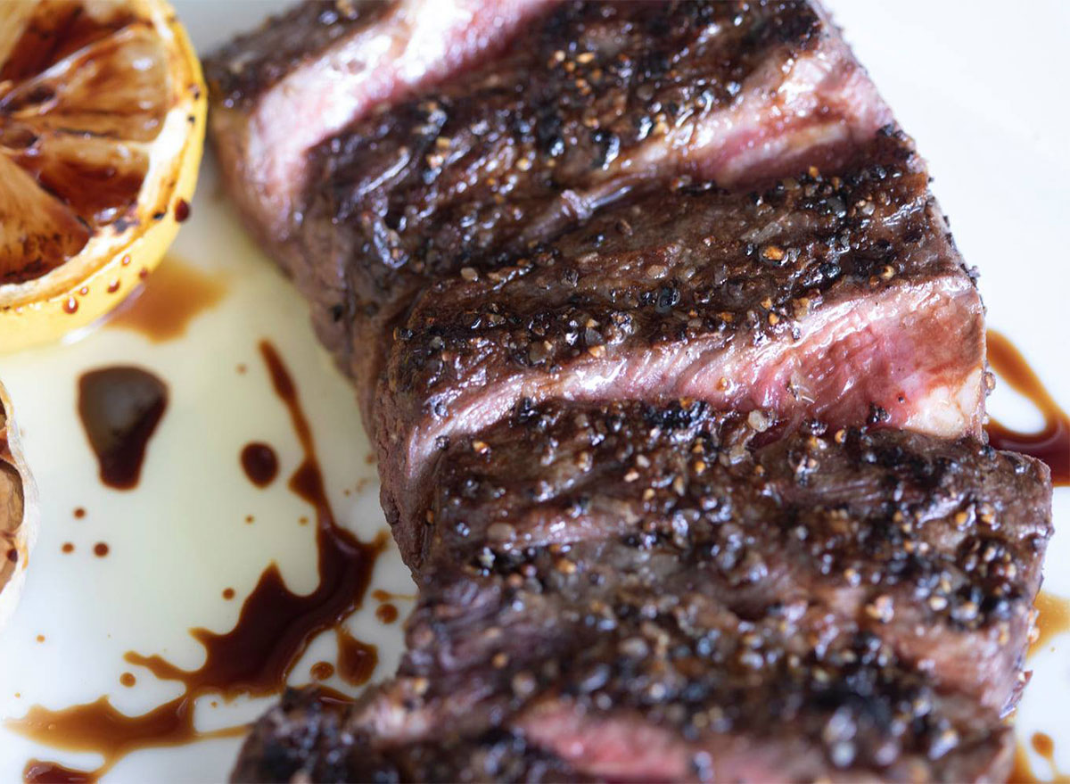 sliced steak with peppercorns