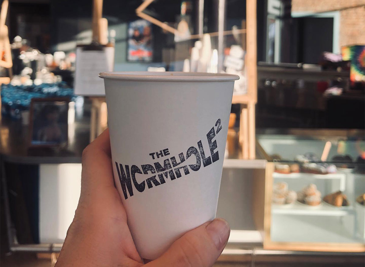 paper cup of coffee from the wormhole chicago