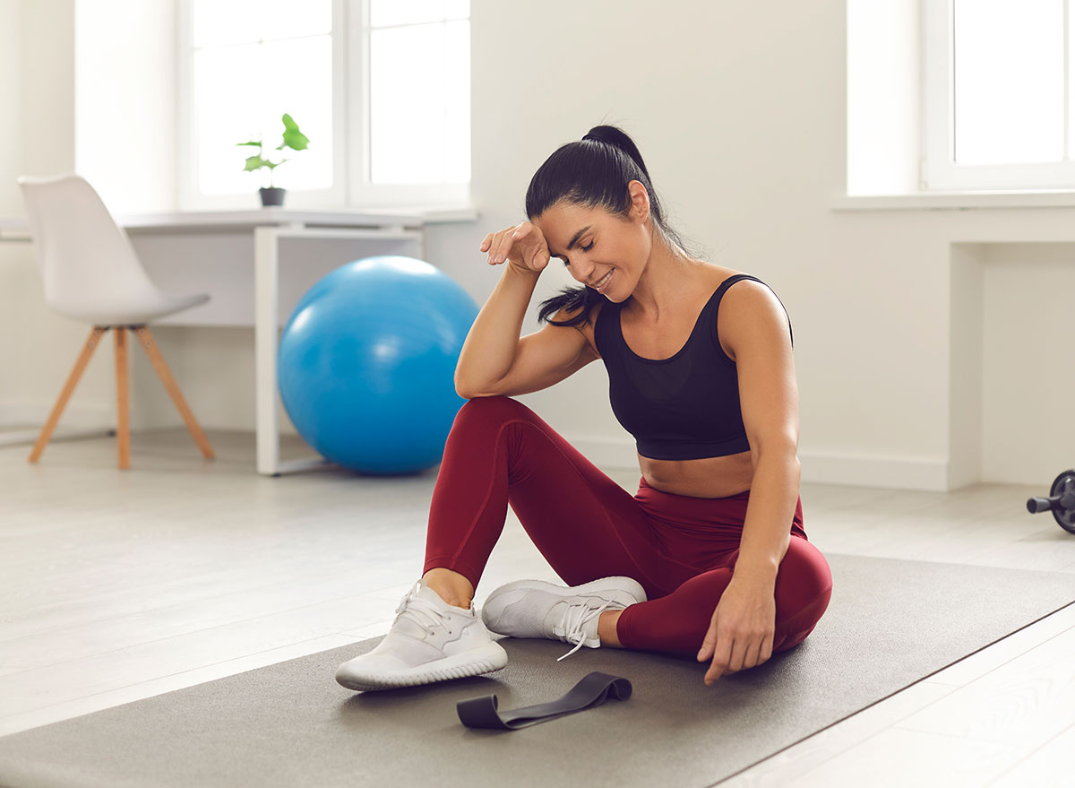 tired woman giving up exercising