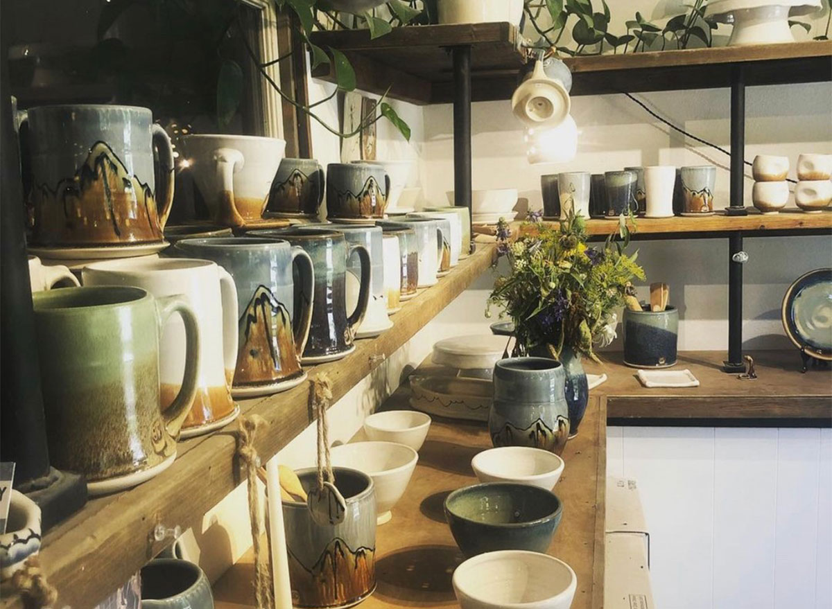 shelves of mugs and pottery