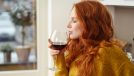 woman drinking wine alcohol at home