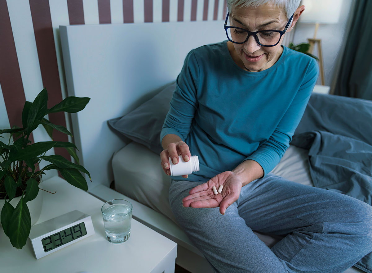woman taking melatonin