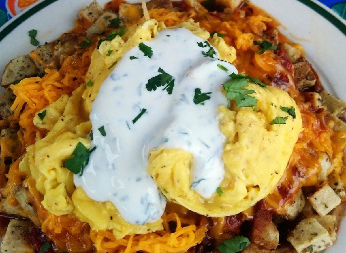 breakfast hash topped with eggs hollandaise