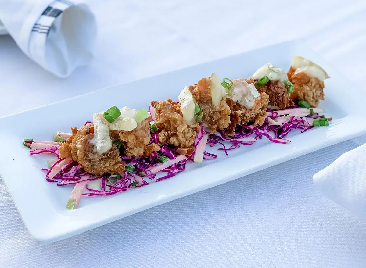 fried oysters topped with brie cheese