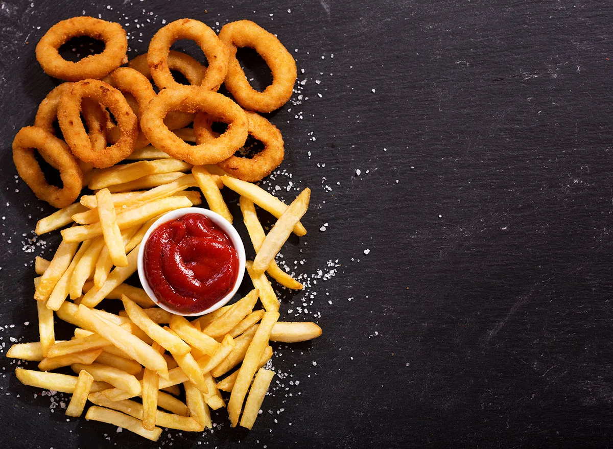 onion rings and fries with ketchup