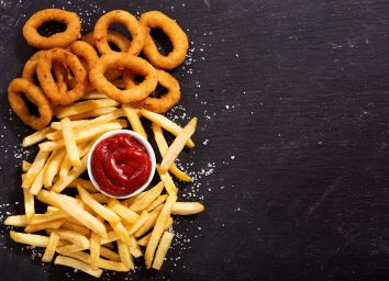 onion rings and fries with ketchup