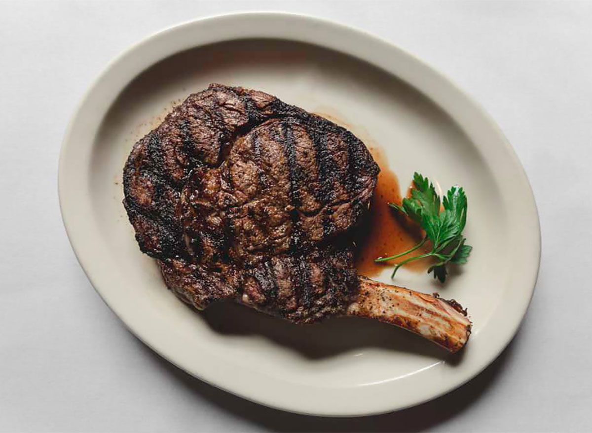 ribeye on plate with garnish