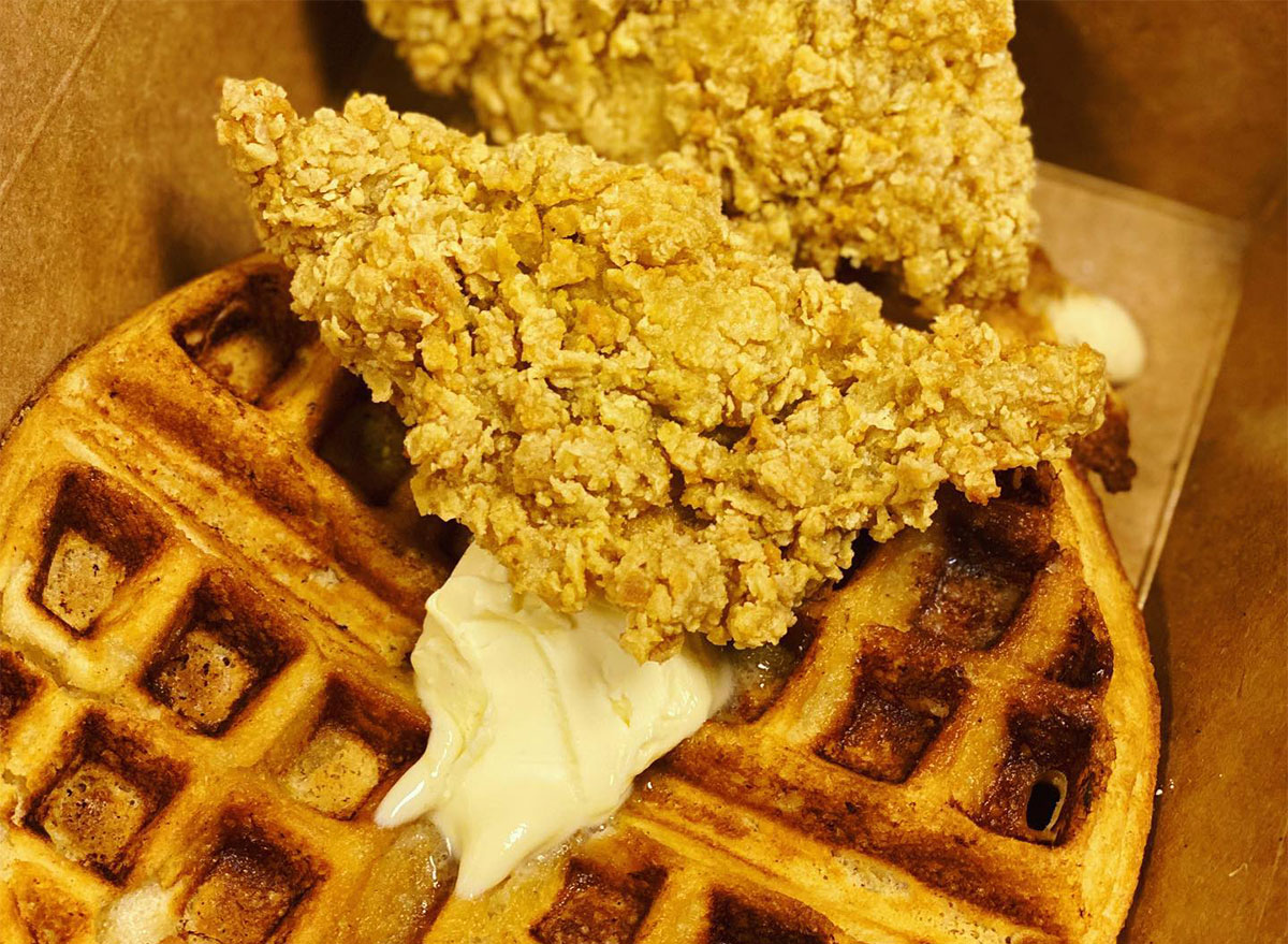 plate of vegan chicken and waffles