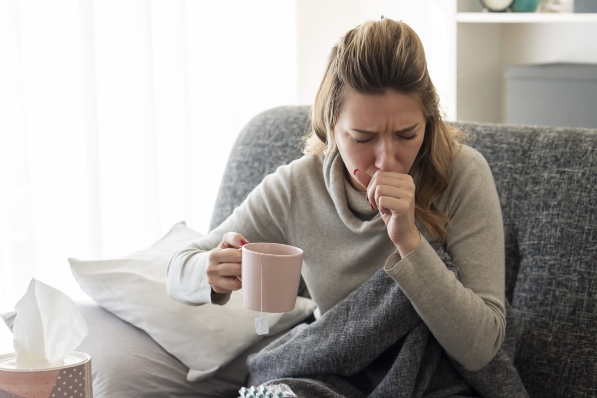 Sick woman with flu at home