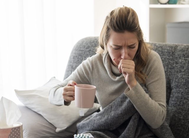 Sick woman with flu at home