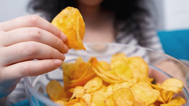 1 Biggest Danger Sign You Re Eating Too Many Potato Chips Say Experts