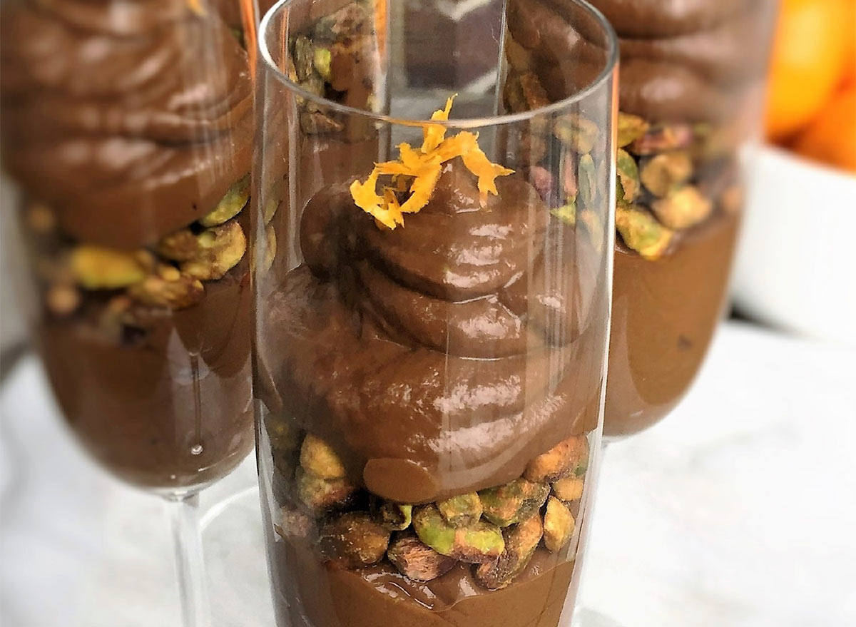 vegan dark chocolate layered pudding topped with wonderful pistachios and orange zest