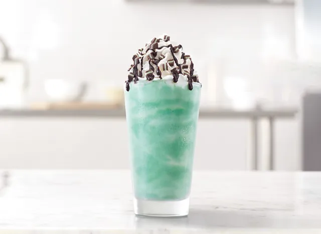 arbys mint shake on a table.