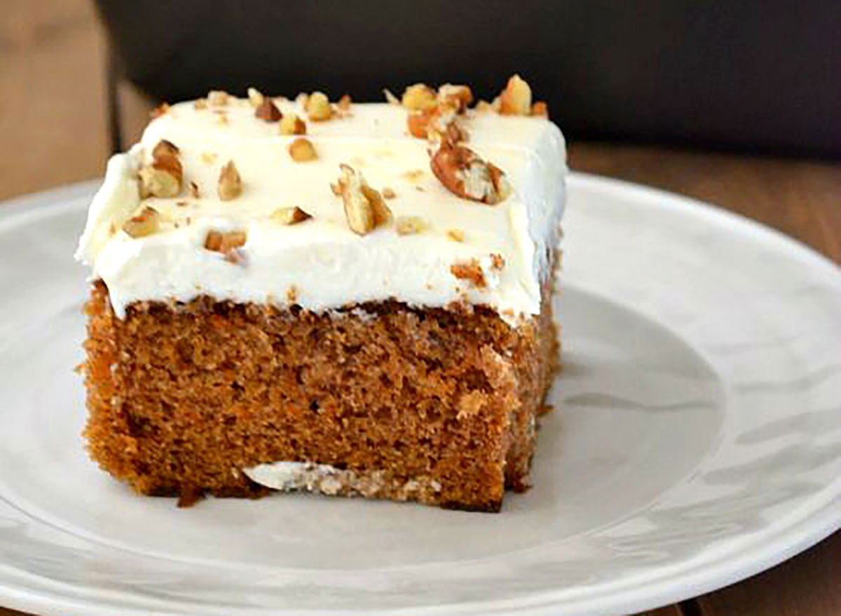 slice of carrot cake on a white plate