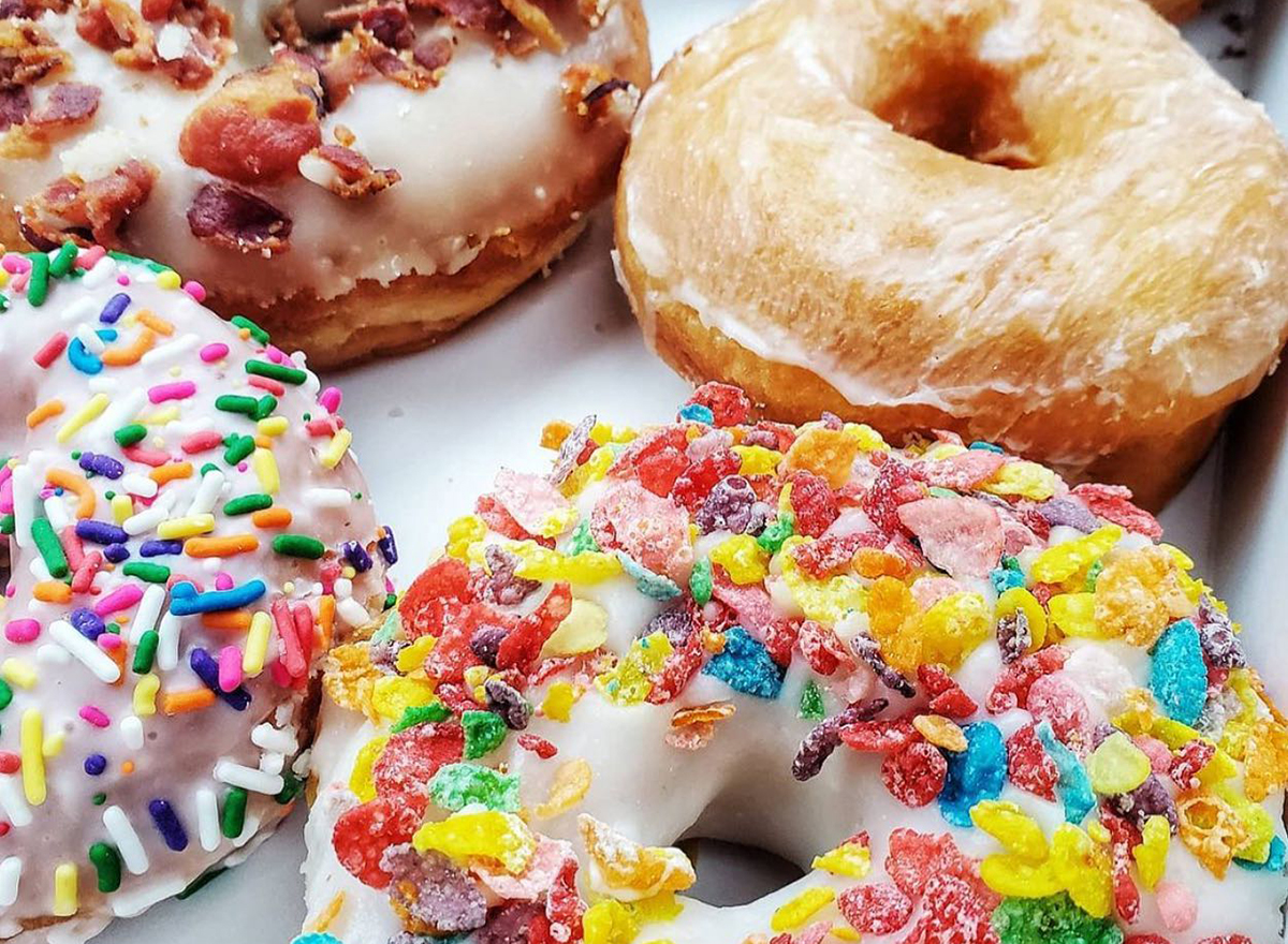 assorted sprinkled and glazed donuts
