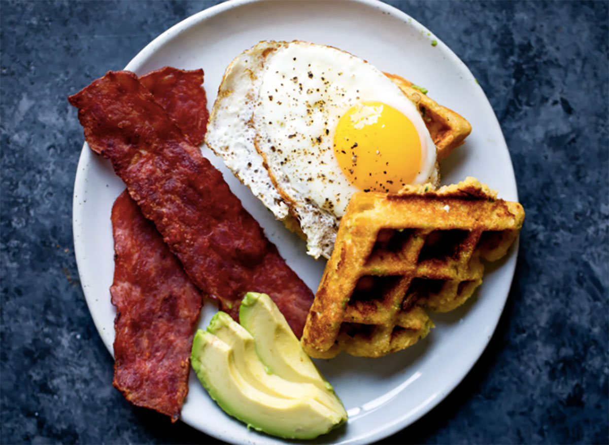 cornbread waffle with turkey bacon egg and avocado