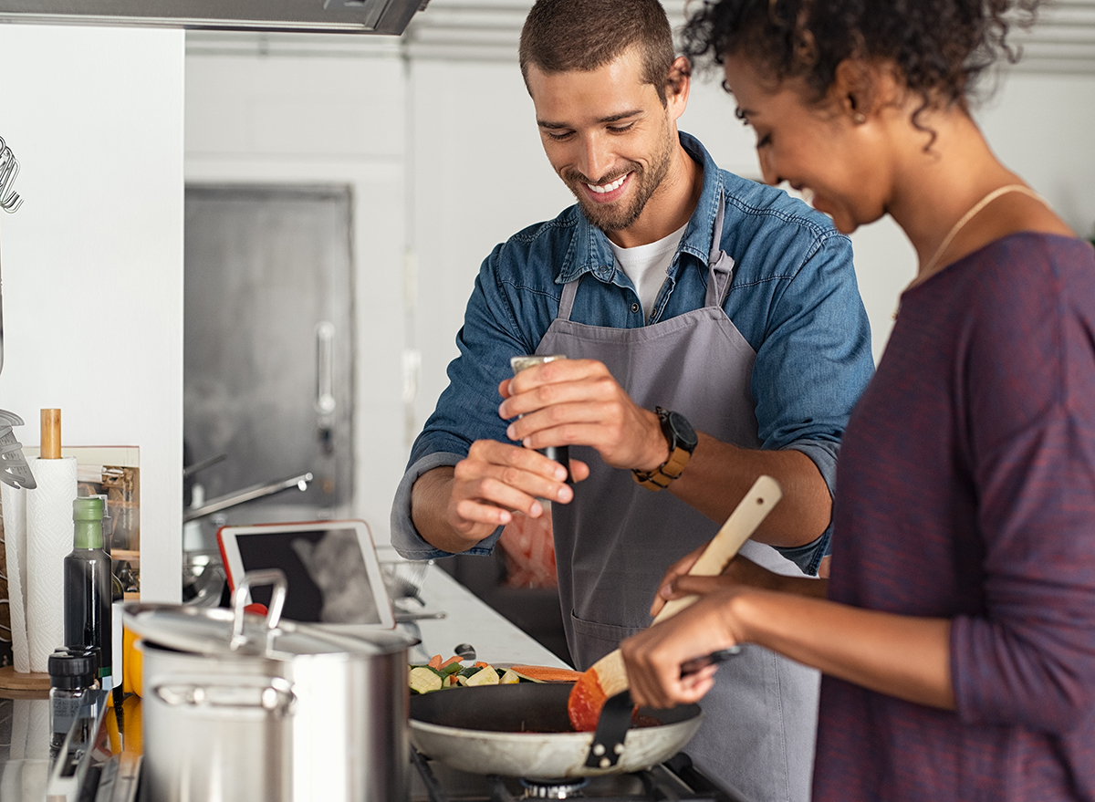 couple cooking together