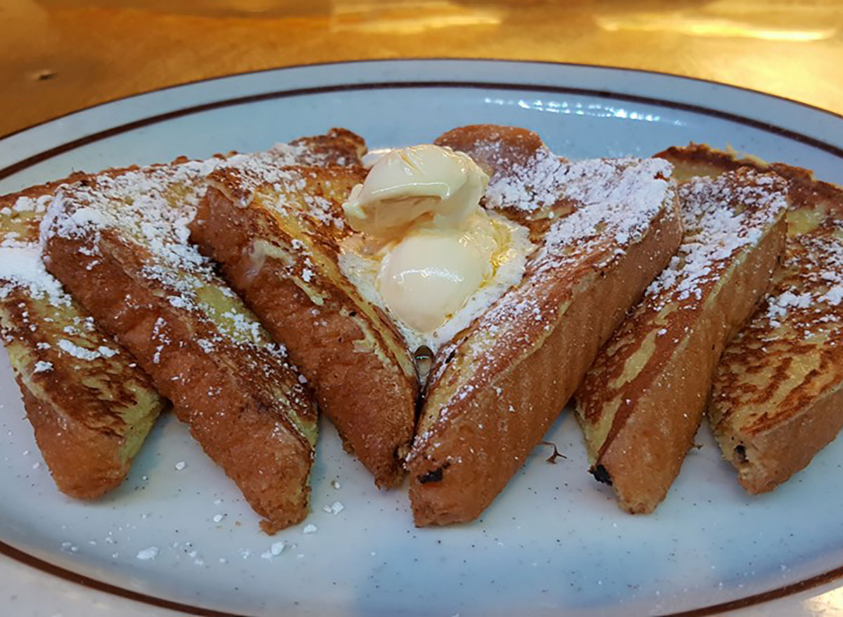 slices of french toast with butter and powdered sugar