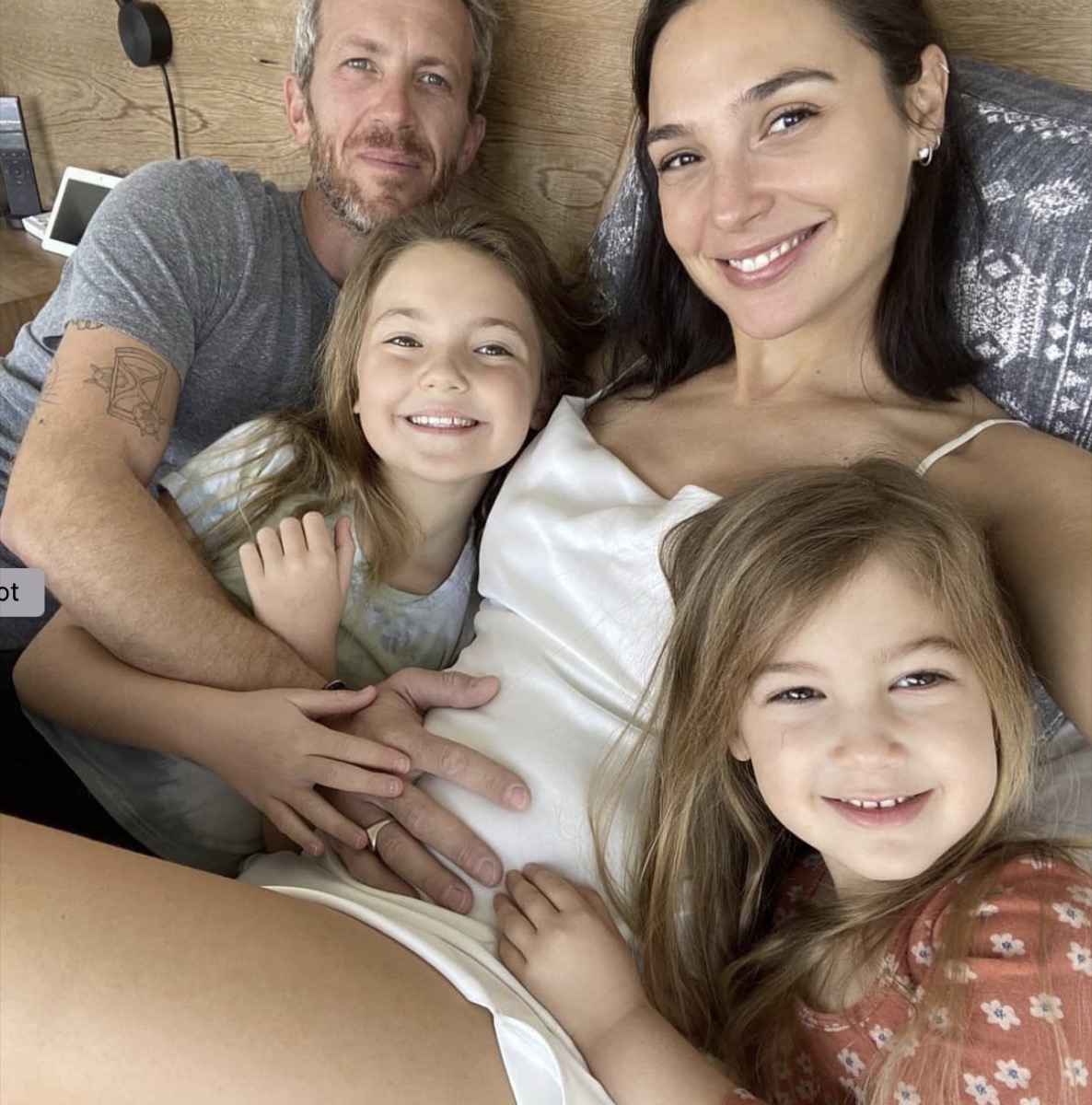 gal gadot and husband and two daughters in bed