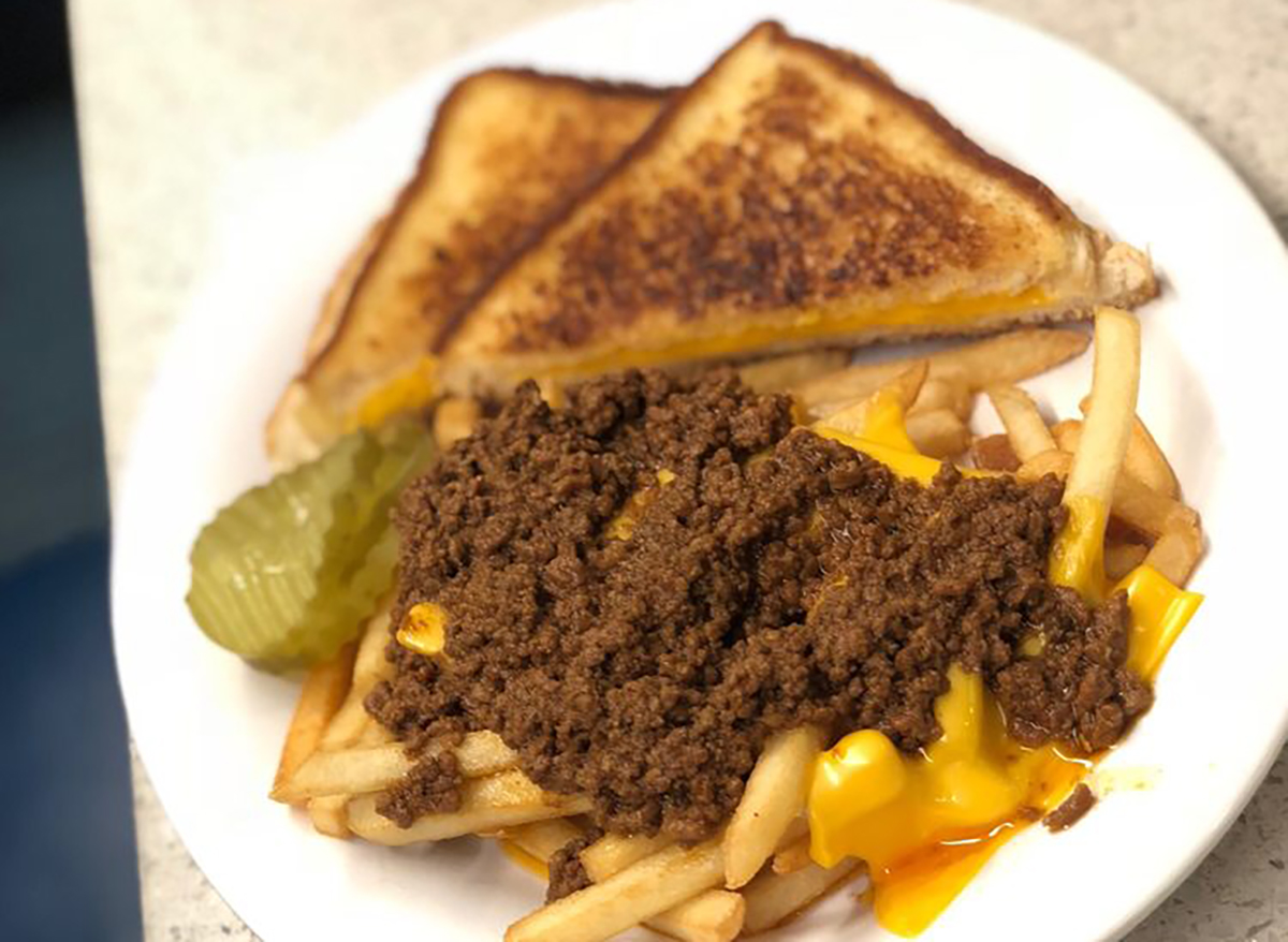 grilled cheese with fries topped with beef