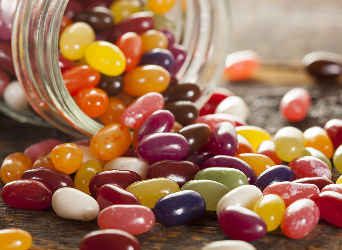 toppled jar of multicolored jelly beans