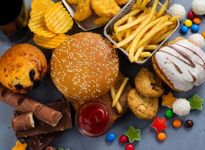 pile of unhealthy junk foods