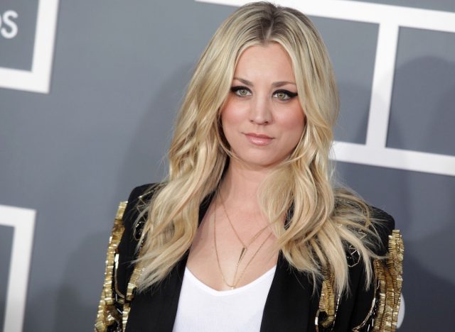 kaley cuoco in black jacket on red carpet