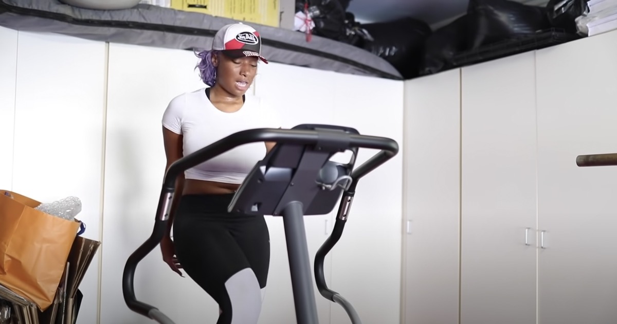 megan thee stallion working out on stair stepper