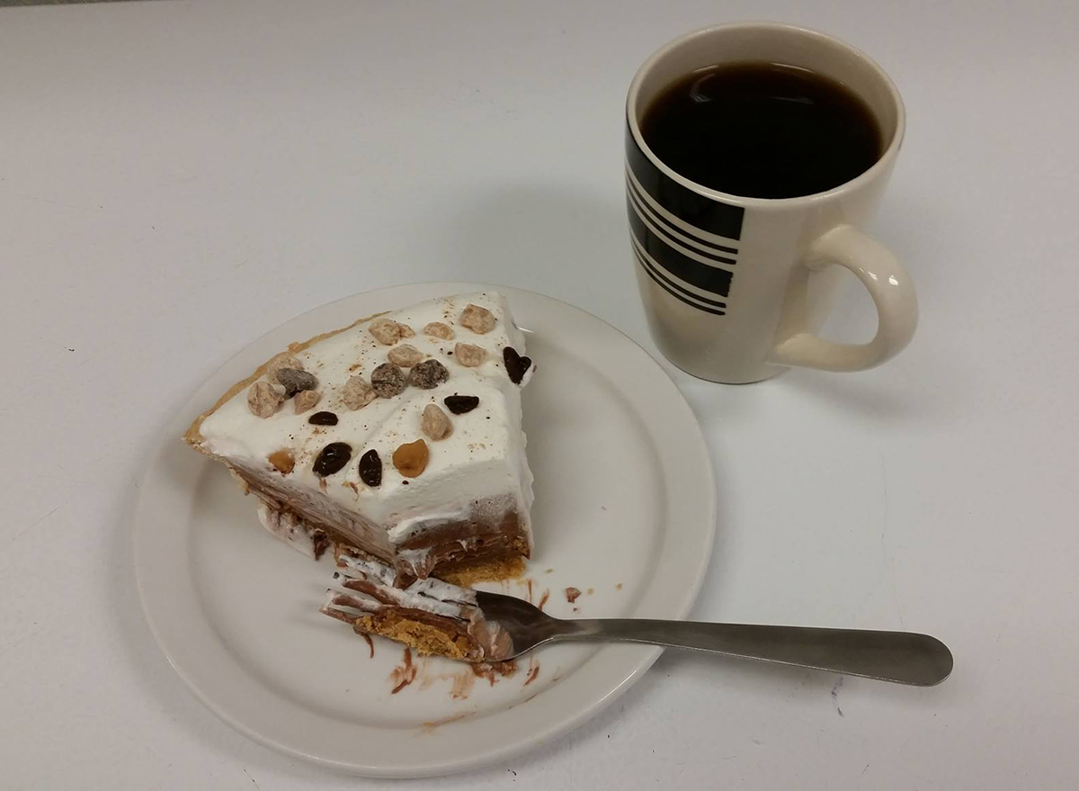 slice of chocolate pie with mug of coffee