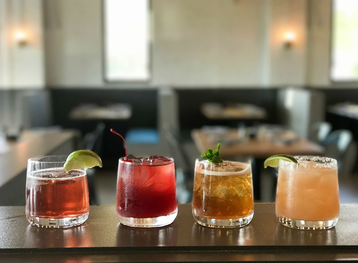 row of cocktails from queen park social in charlotte