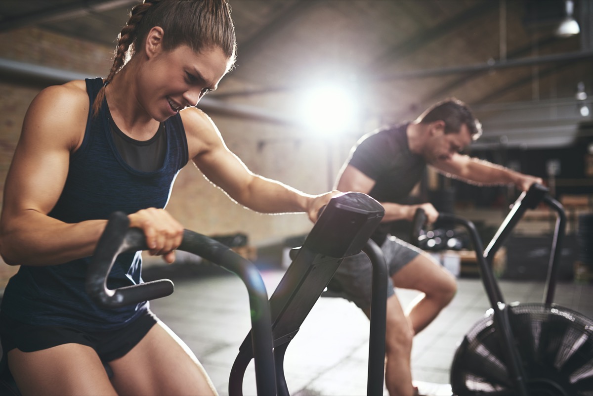 people working on exercise bikes