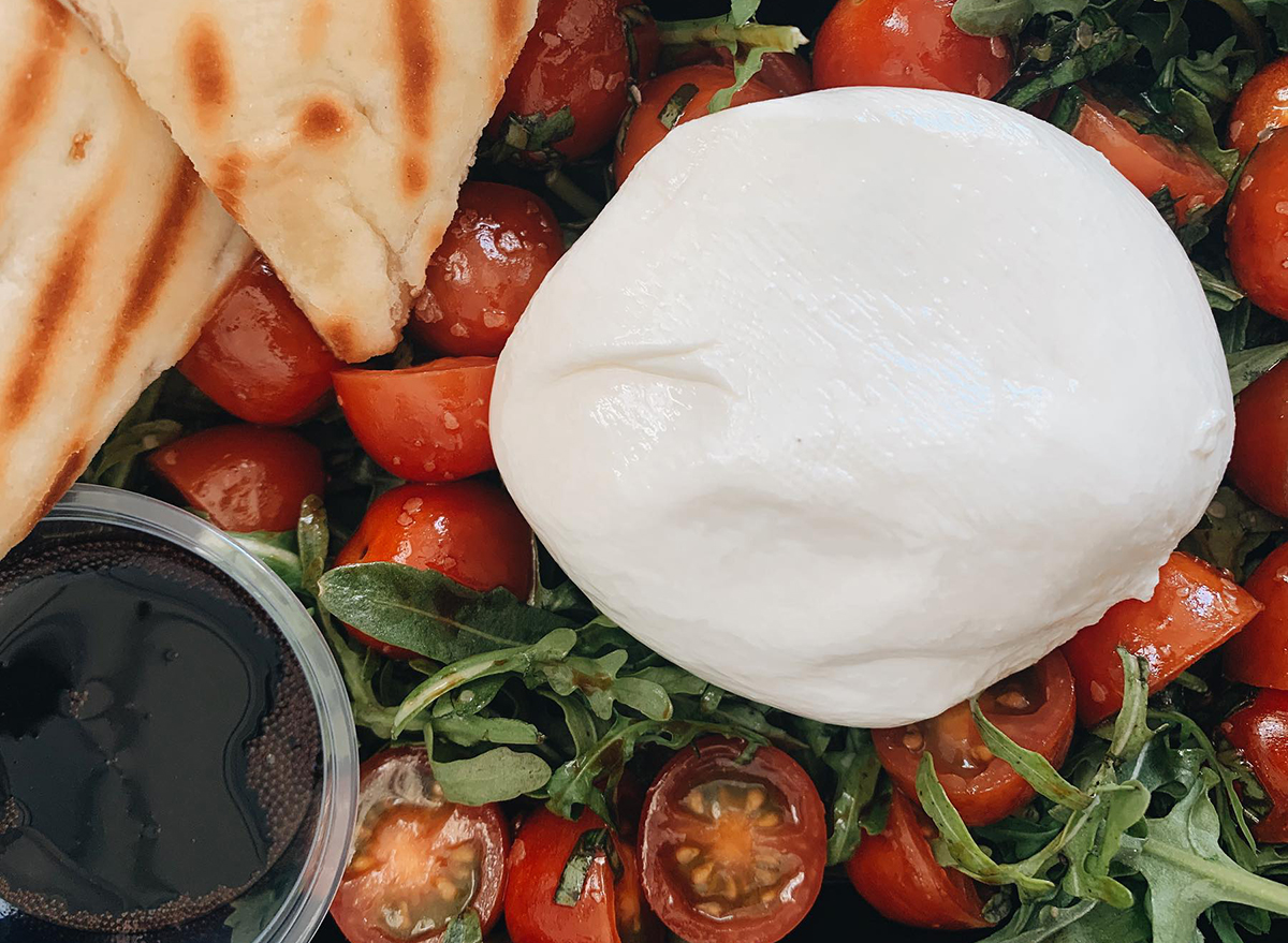 arugula and tomatoes with burrata