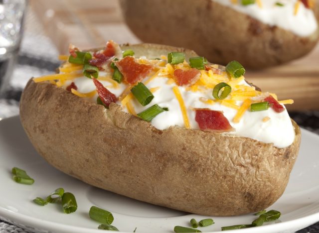 baked potato with chives and sour cream