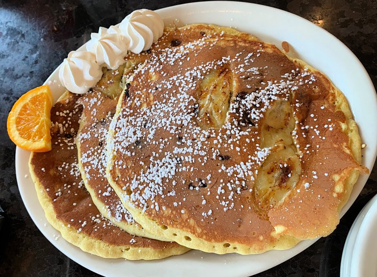 pancakes topped with powdered sugar