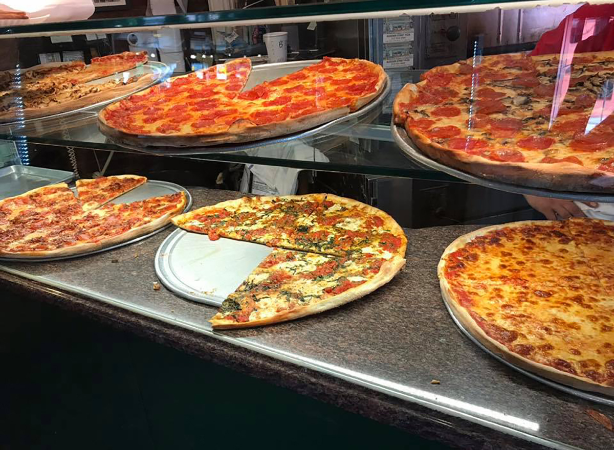 slices of pizza in display case