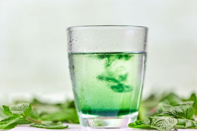 Chlorophyll water with fresh green mint ontable