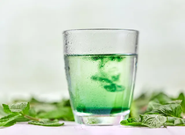 Chlorophyll water with fresh green mint ontable