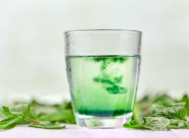 Chlorophyll water with fresh green mint ontable