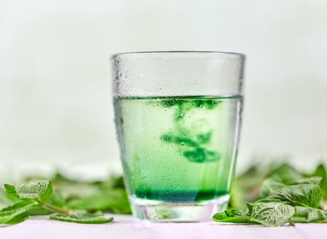 Chlorophyll water with fresh green mint ontable