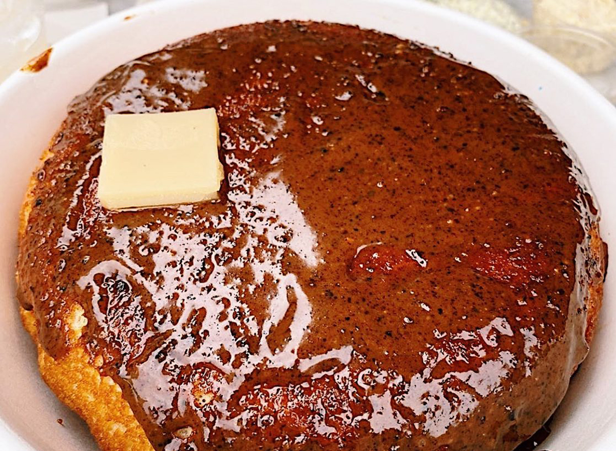 chocolate pancake topped with butter