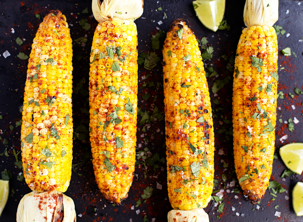 corn cobs with cilantro and paprika