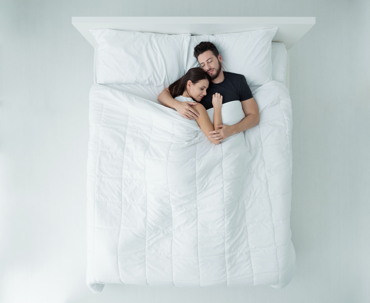 couple sleeping in bed