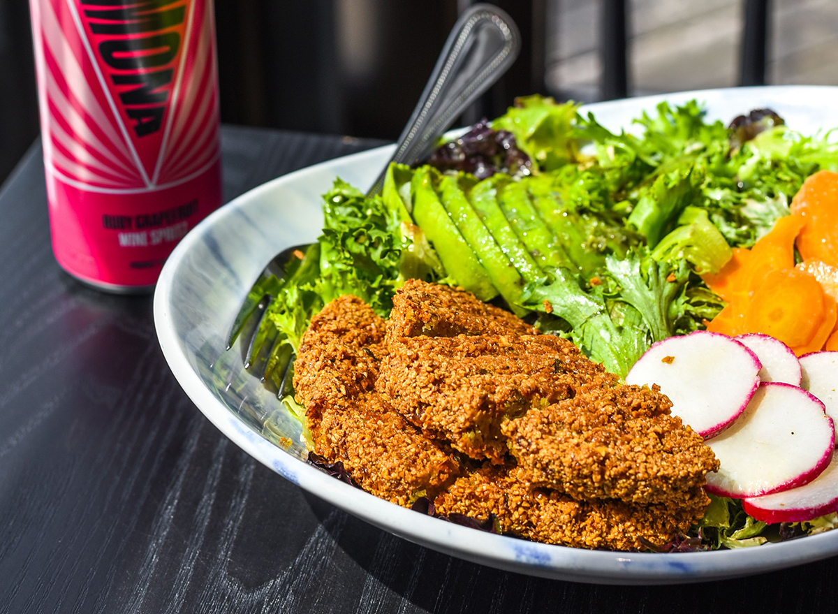 vegan falafel salad bowl with radishes and carrots