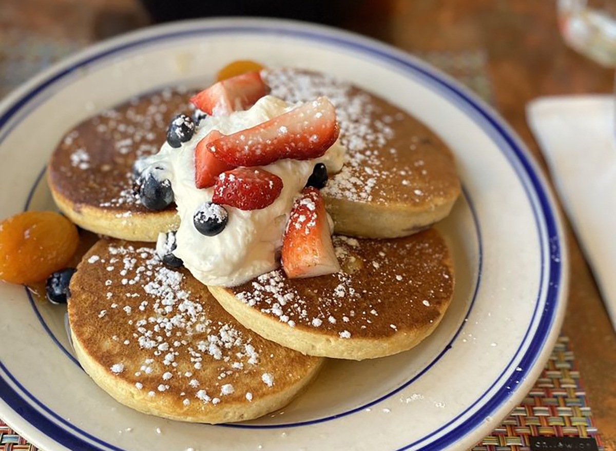 pancakes with whipped cream and berries