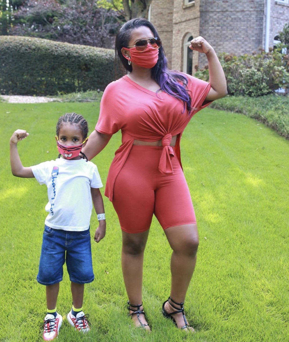 kandi burruss and son ace flexing outdoors on their lawn